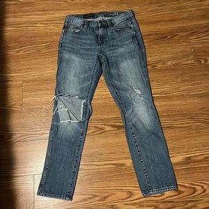 J. Crew Boyfriend style jeans in size 24 with rips at the knee in medium wash